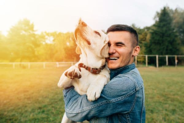 Owner hug his dog